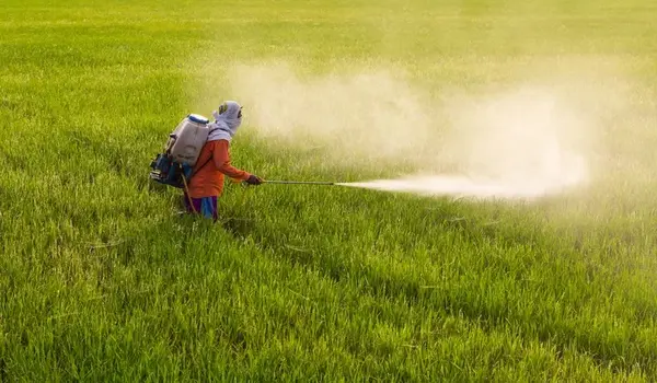 How does Silk improve the efficacy of spread adjuvants in agricultural applications?